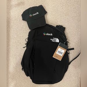 Slack dad hat and North Face backpack with tags